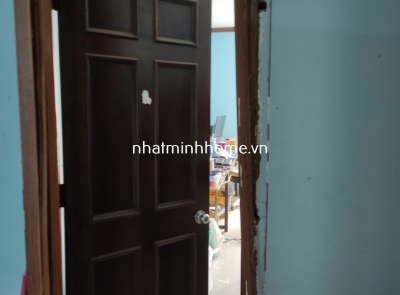 Dịch Vụ Thay Khung Cửa Gỗ Bị Mối Mọt Tại Chung Cư HAGL, Quận 7 - Giải Pháp Composite Màu B5 Tối Ưu